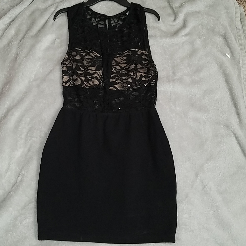 Semi formal Black dress with sequins.